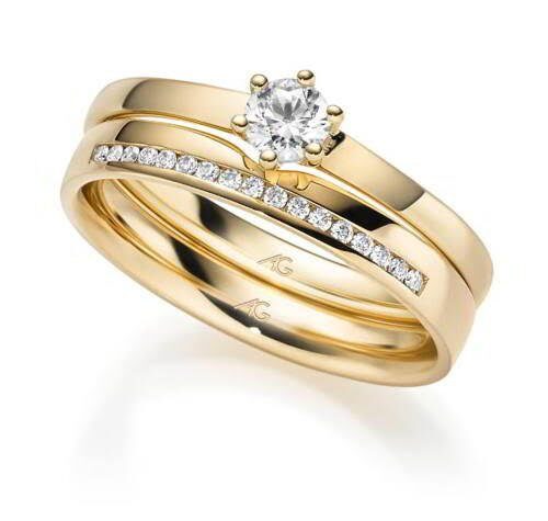 Geelgouden ringenset met solitair en diamantrij